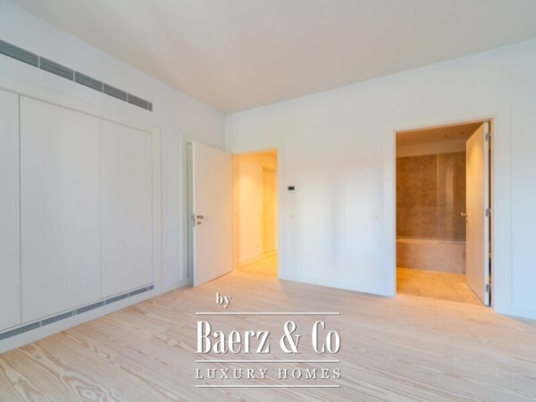 photo 14 Three-Bedroom Duplex with Balcony, Two Parking Spaces, and Storage Room